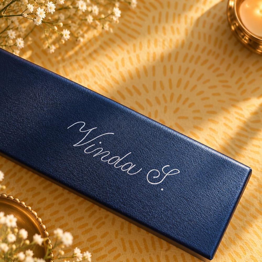 Navy pen case personalised with a name in silver foil calligraphy